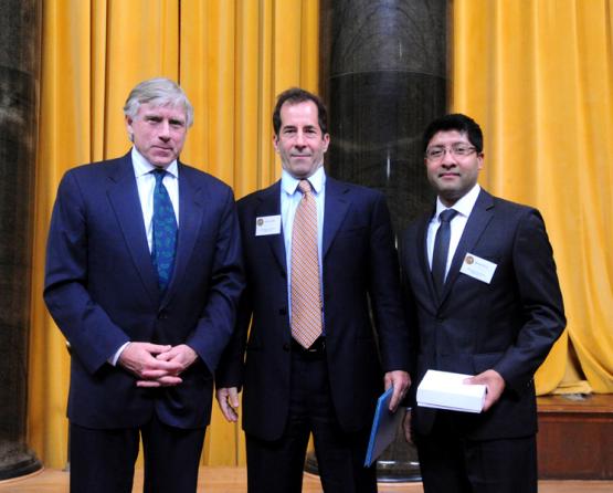 Lee C. Bollinger presents the 2011 Pulitzer Prize in Public Service to Jeff Gottlieb (center) and Ruben Vives (right) representing the Los Angeles Times.