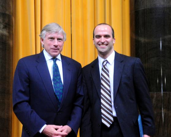 Lee C. Bollinger (left) presents the 2011 Pulitzer Prize in Commentary to David Leonhardt of The New York Times.