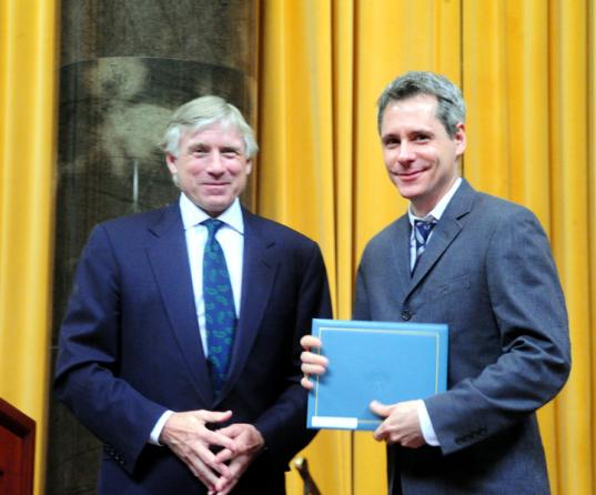 Lee C. Bollinger (left) presents the 2011 Pulitzer Prize in Drama to Bruce Norris.