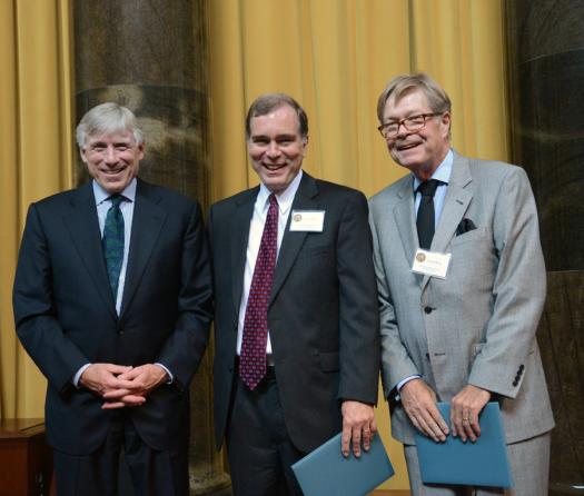 Lee C. Bollinger (left) presents the 2013 Pulitzer Prize in Editorial Writing to Tim Nickens (center) and Daniel Ruth of the Tampa Bay Times.