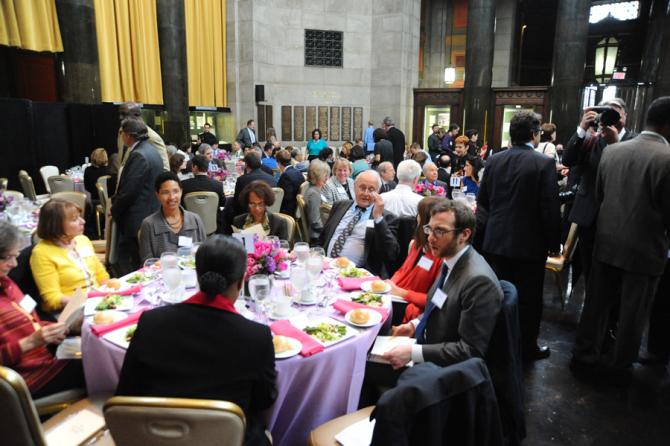Luncheon guests seated in the Rotunda at Columbia University's Low Library.
