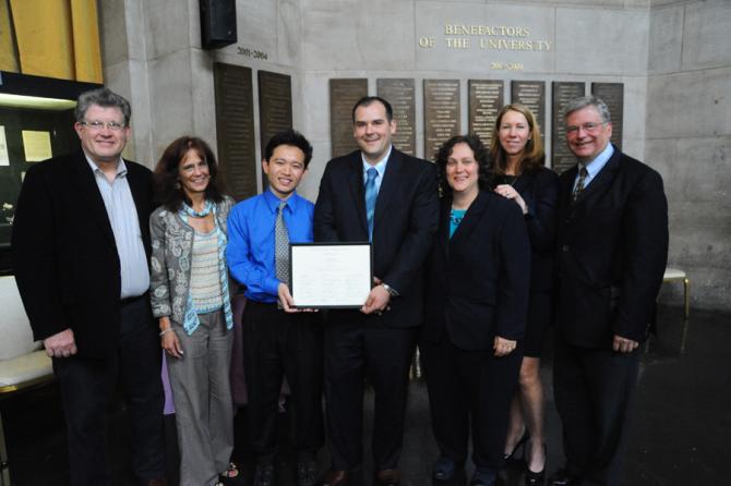 Members of Columbia University's CUIT staff display the special certificate they received for developing the new online Pulitzer entry system. (left to right) Chuck Eigen, Candace Fleming, Jake Young, Ivan Lozuk, Carol Kassel, Patricia Lee and Jeff Scott.