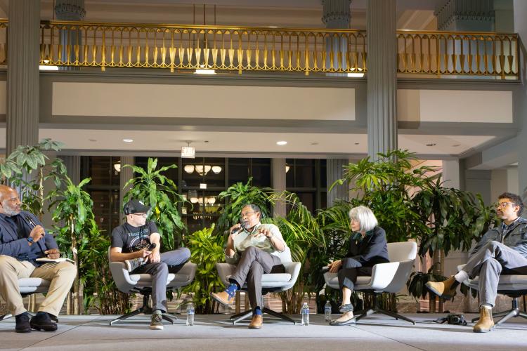 At left, Jelani Cobb, Pulitzer board member and moderator, in conversation with Pulitzer winners (from left to right): 2026 Fiction winner Daniel Kraus, 2025 Fiction winner Percival Everett, 2026 Biography winner Amanda Vaill, 2021 Breaking News Photography winner, Jon Cherry of Getty Images